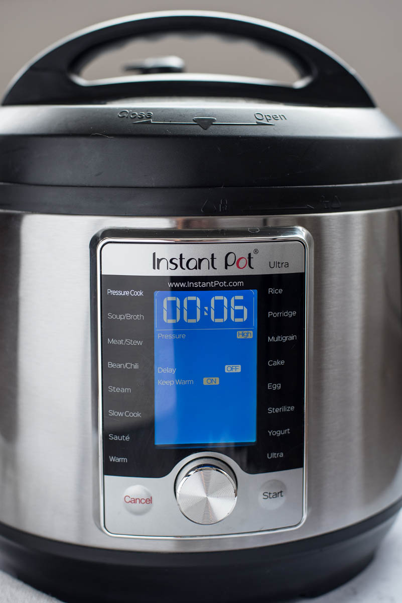 a head-on shot showing an Instant Pot Ultra with the cook time set to 6 minutes at high pressure