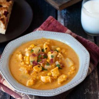 Pressure Cooker (Instant Pot) Pumpkin Chicken Corn Chowder served in a white bowl