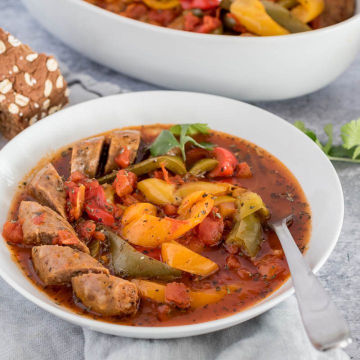 Close up picture of a bowl of Instant Pot sausage and peppers diced and ready to eat.