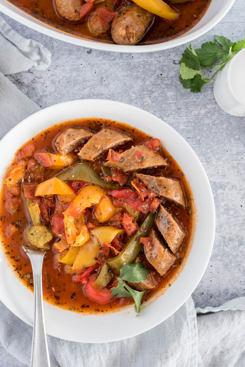 Overhead shot of a bowl of Instant Pot sausage and peppers diced and ready to eat.
