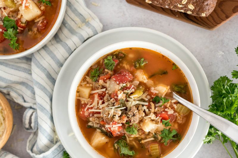 bowl of tomato sausage and potato soup