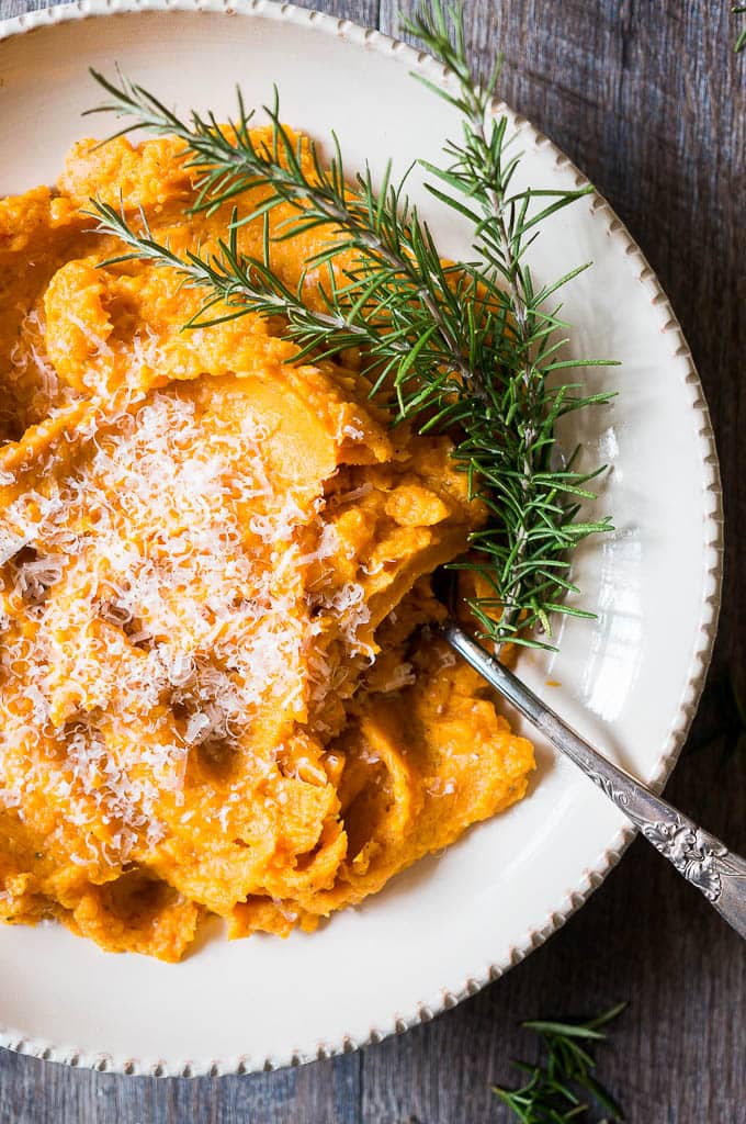 Pressure Cooker Savory Mashed Sweet Potatoes with savory herbs and nutty parmesan cheese.