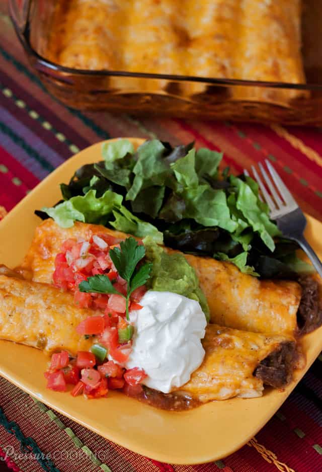 Slow cooked flavor in a fraction of the time - Pressure Cooker Shredded Beef Enchiladas