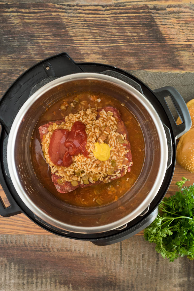 Overhead picture of all the ingredients for easy sloppy joes from frozen beef placed in an Instant Pot.