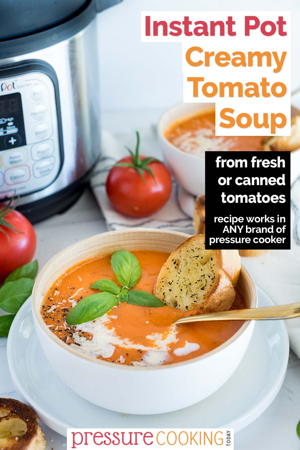 Pinterest button that reads "Instant Pot Creamy Tomato Soup: from fresh or canned tomatoes" over a 45 degree image of a white bowl filled with tomato basil soup, with an Instant Pot and fresh tomatoes in the background via @PressureCook2da