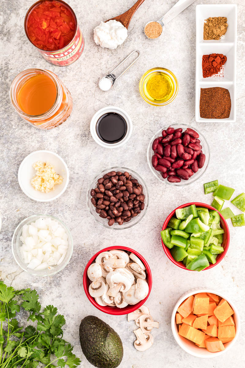 all of the ingredients for Instant Pot vegetarian chili arranged in prep bowls ready to go into the Instant Pot